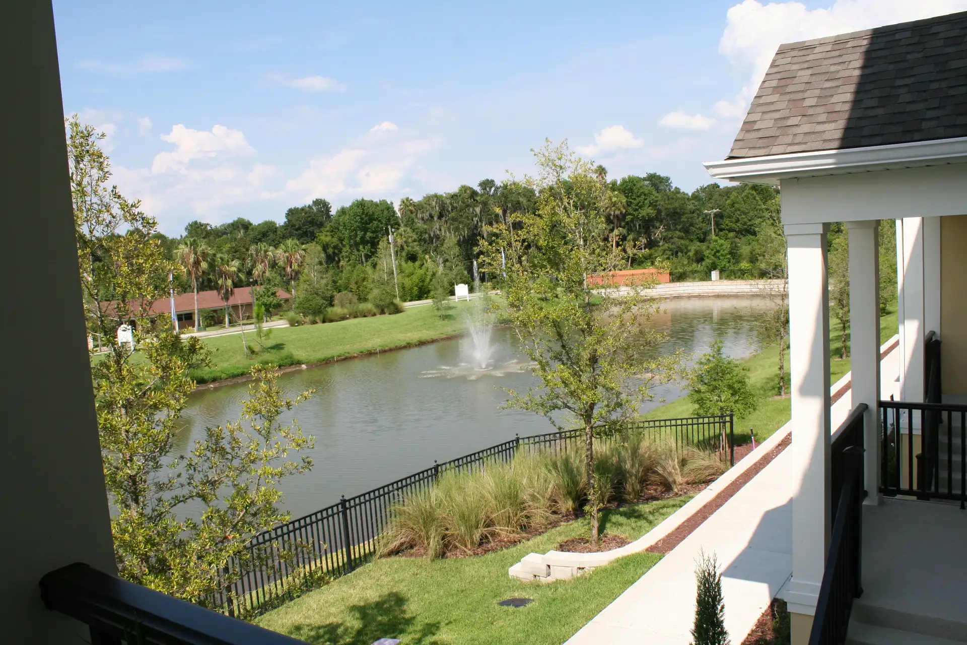 A landscaped pond and fountain in a residential community in Winter Springs, Florida