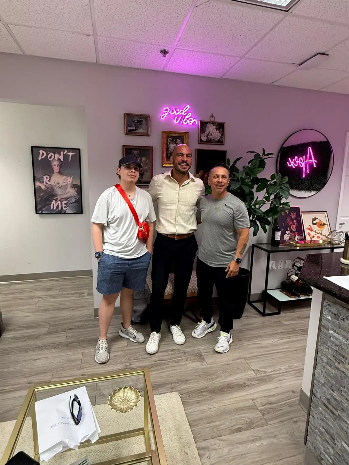 Jose with two clients at the title office after closing